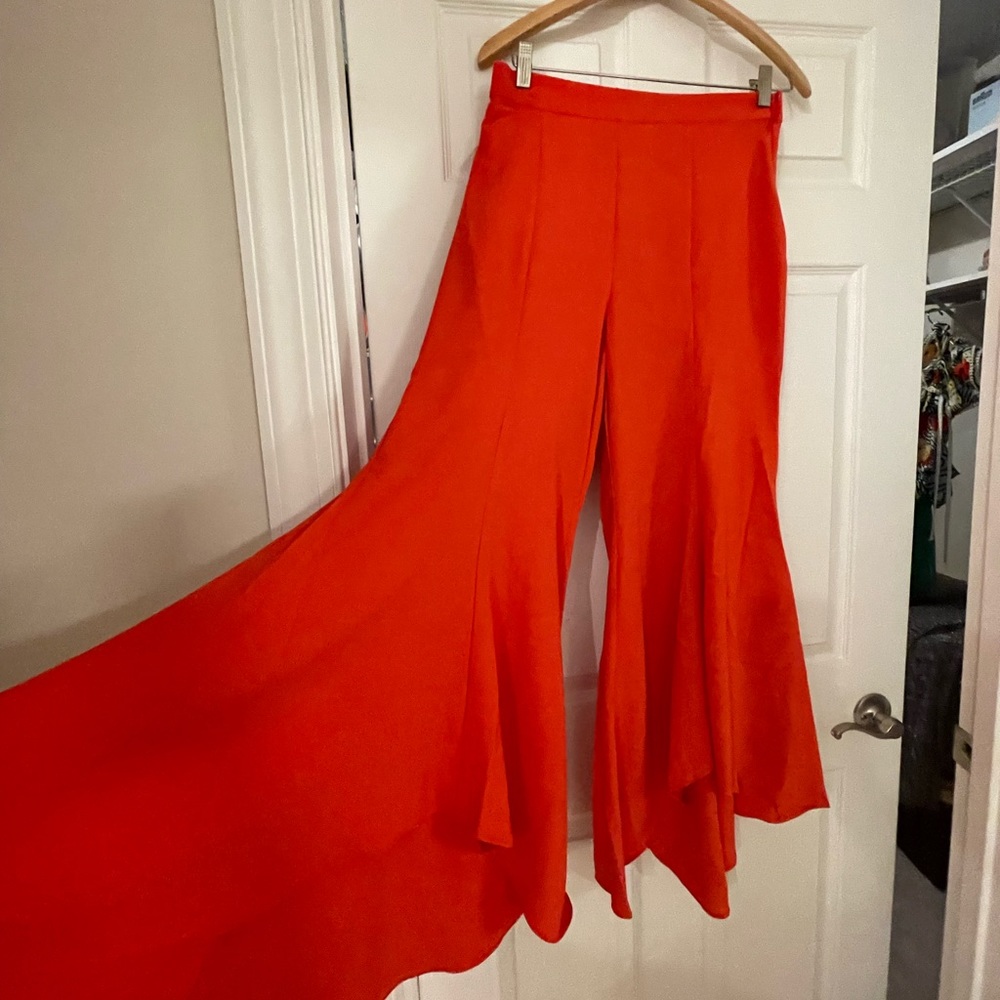 NWOT pants size s. Redish/coral color by Venus.